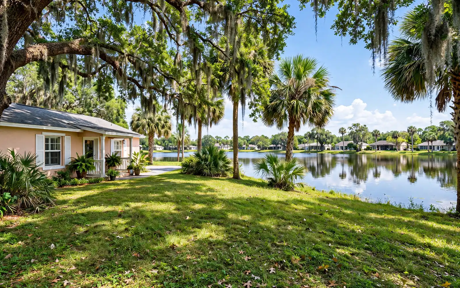Home with a wide green yard near Lake Ariana in Auburndale, Florida